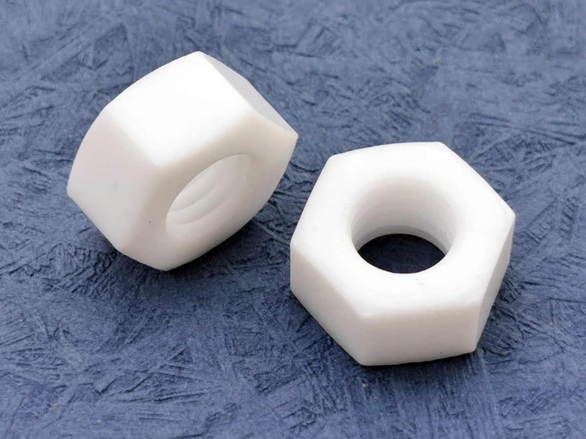 Hochtemperaturbeständige chemikalienbeständige PTFE-Sechskantmuttern Hochtemperaturbeständige chemikalienbeständige PTFE-Sechskantmuttern